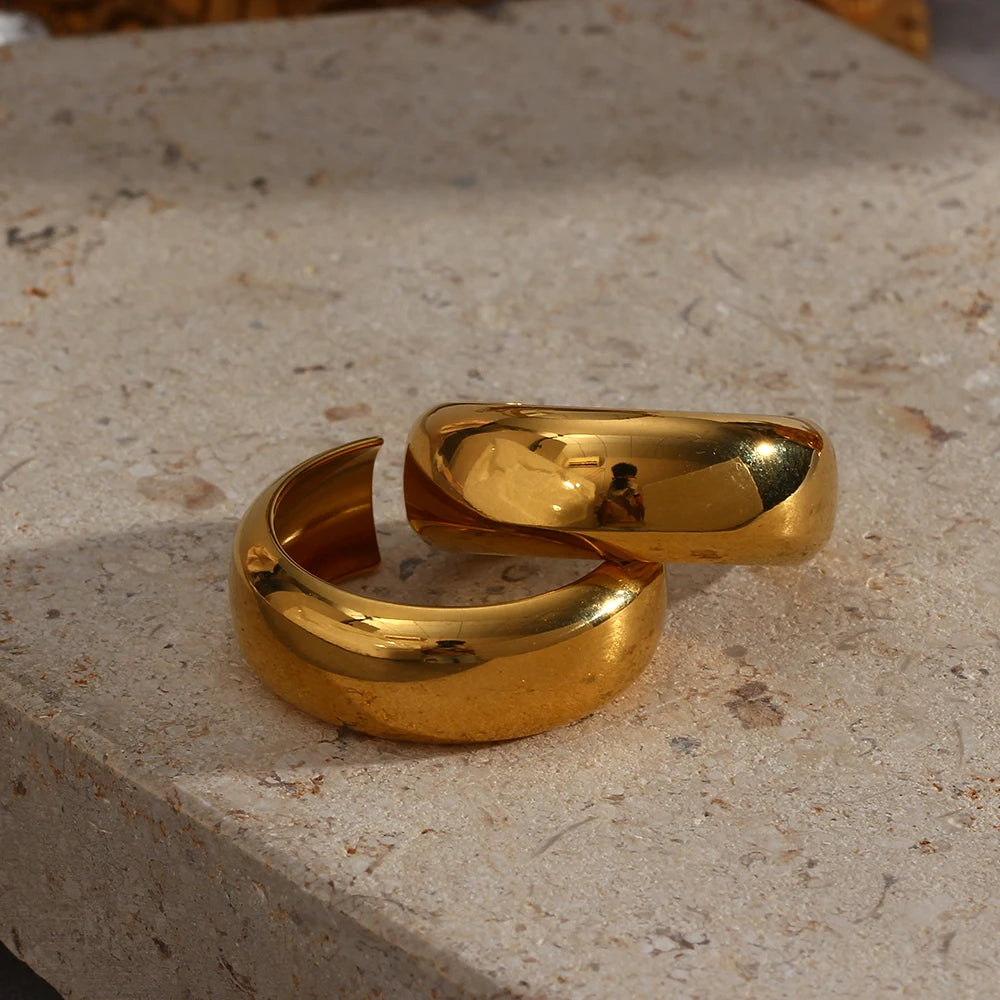Gold ring on a textured stone surface