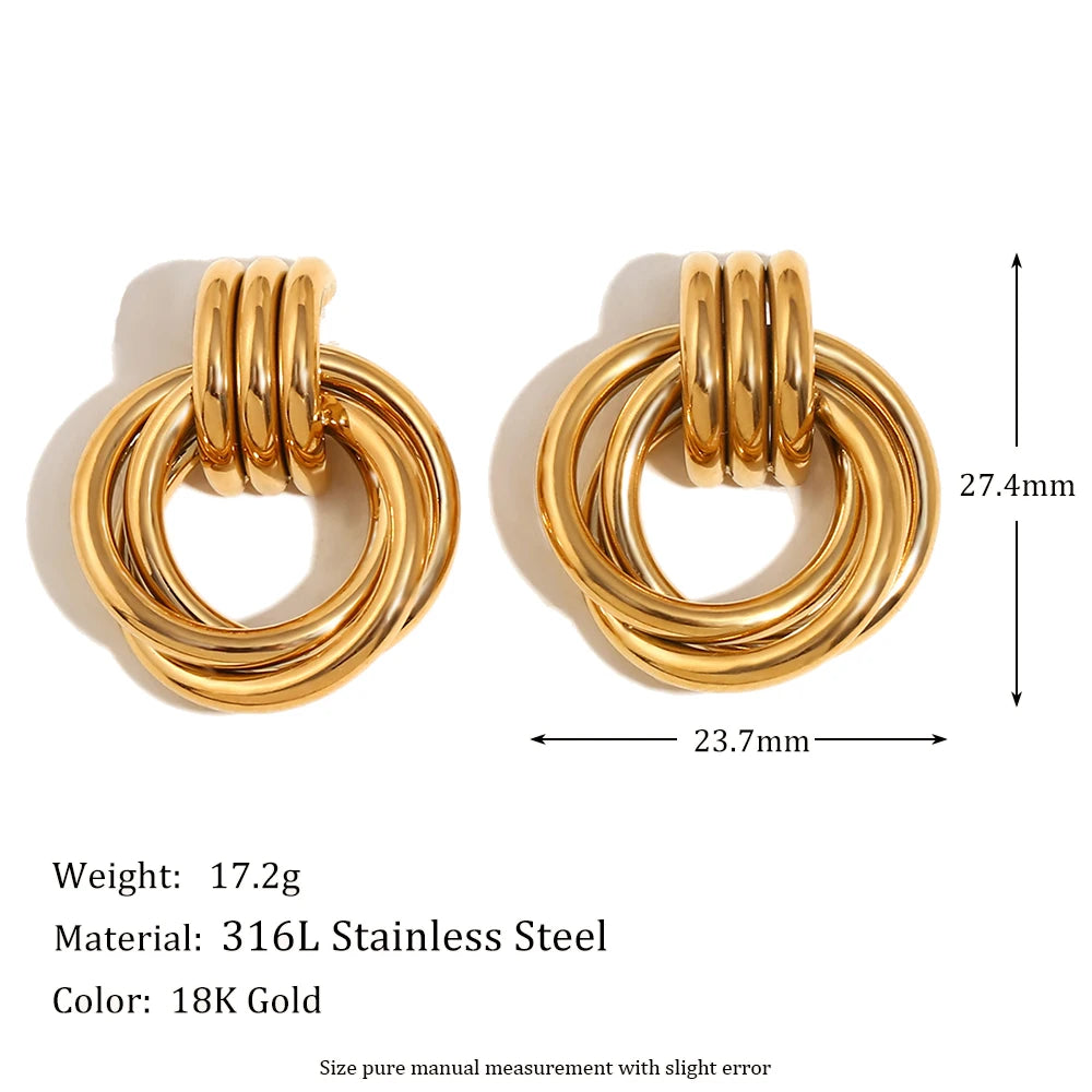 Gold hoop earrings with measurements and material details on a white background