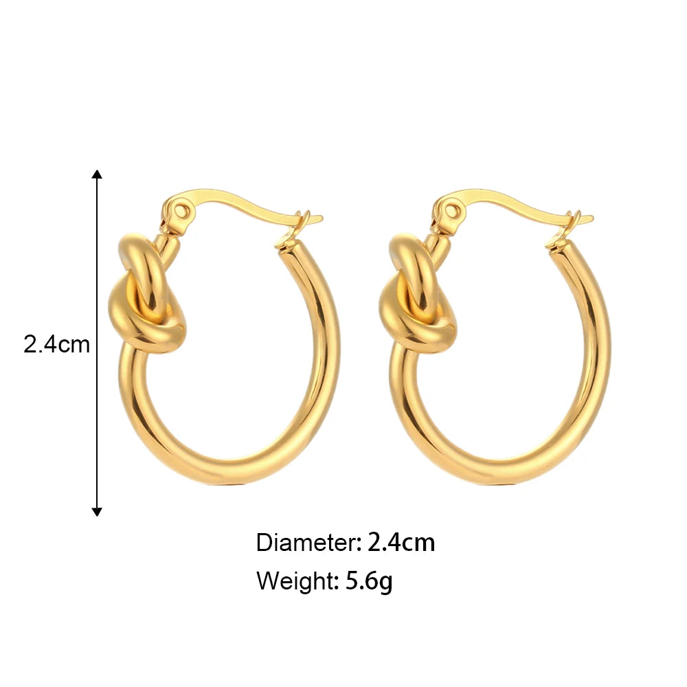 Gold hoop earrings with measurements on a white background