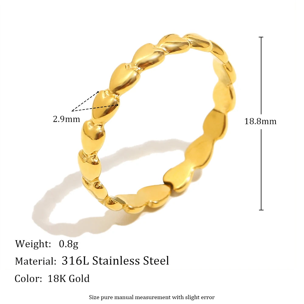 Gold ring with measurements and material details on a white background